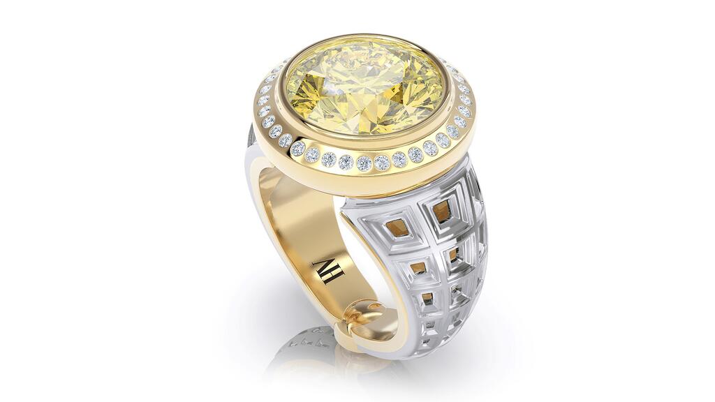 The “Dreamer” ring from Alice Herald in 18-karat yellow and white gold with a 9.08-carat round brilliant yellow sapphire ($63,800) Dreamer Ring